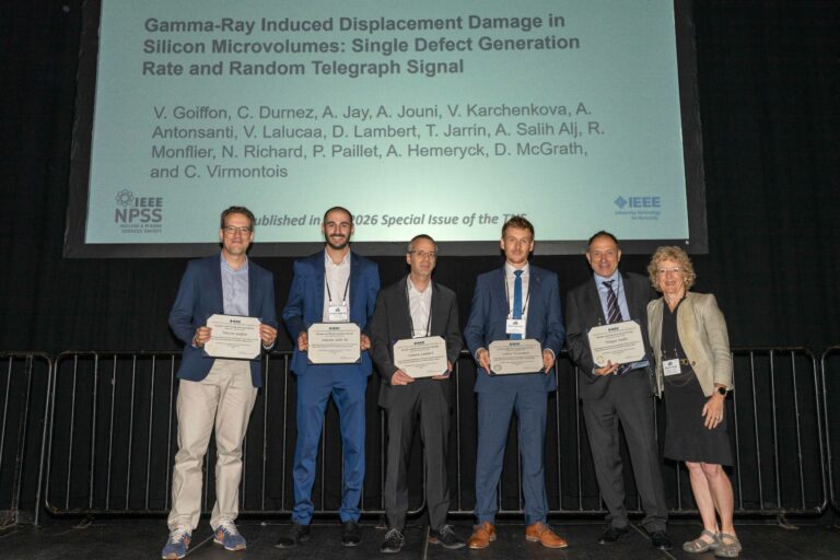 Authors of the Outstanding Conference Paper receiving their award at NSREC 2026 in San Juan