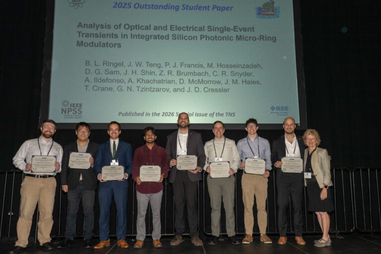 Authors of the Outstanding Student Paper receiving their award at NSREC 2026 in San Juan